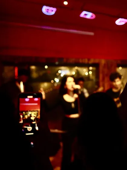 A view from the audience, capturing the live show experience on their phones. We love it when the crowd is engaged and recording their favorite moments.