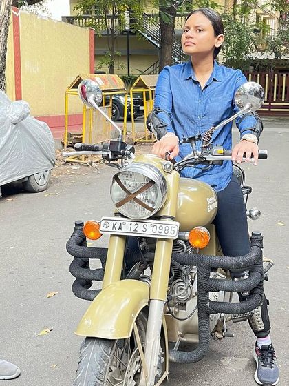 A graduate sits confidently on her bike, a testament to the skills and self-assurance gained in our 2-day camp.