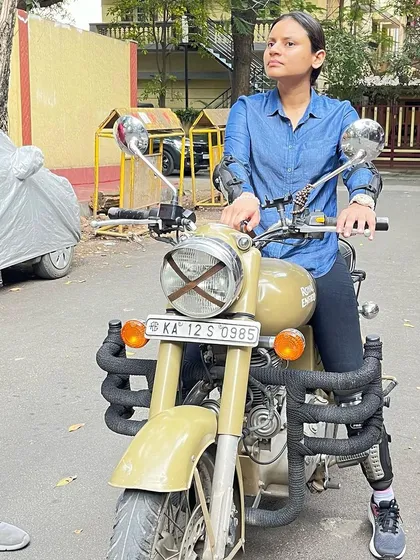 A graduate sits confidently on her bike, a testament to the skills and self-assurance gained in our 2-day camp.