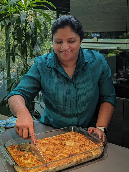 Food for me is tied to my happiest memories, and I started Travancore Tasties to share that feeling with you. Here I am, serving up a bread pudding, a dish that reminds me of my childhood and the big family feasts my Amma used to cook.