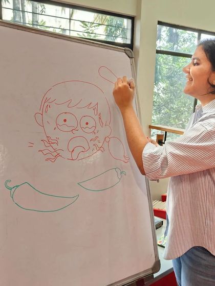 Illustrator Vibha Surya brings a story to life with a live drawing during the book launch of 'A Bounty of Chilies'. Seeing the art created right before their eyes is pure magic for the kids.
