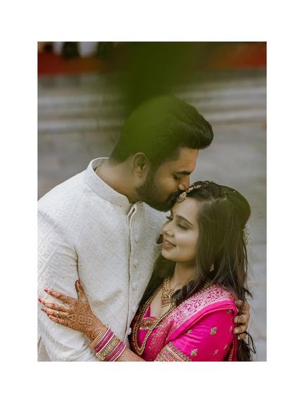 A tender forehead kiss, a classic romantic portrait from Ramya and Sunil's engagement day.