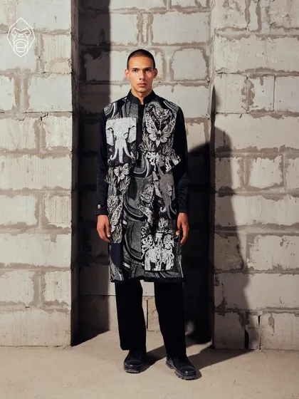 A frontal view of the Mythic Tapestry kurta. This piece is a collage of symbolism and ritual, where folklore motifs like elephants meet modern fashion in a striking noir palette.