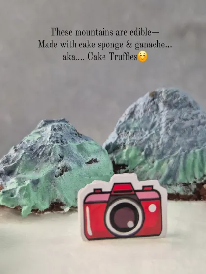 This mountain-themed cake was a special request for a road trip lover. The mountains are actually edible cake truffles made from cake sponge and ganache, showing how I can get creative without using fondant.