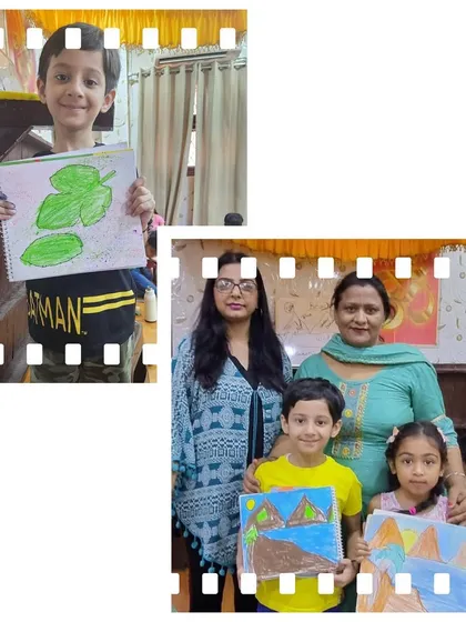 A snapshot of students with their finished landscape drawings, posing with their teachers. We celebrate every small achievement.