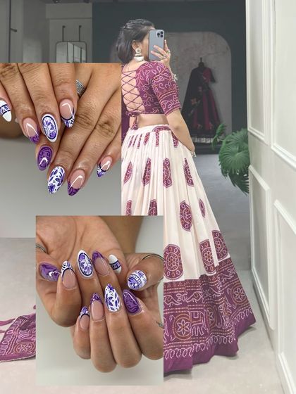 This nail art was custom-designed to match the purple and white bandhani-style lehenga. The intricate patterns on the nails mimic the fabric's design, creating a perfectly coordinated festive look.
