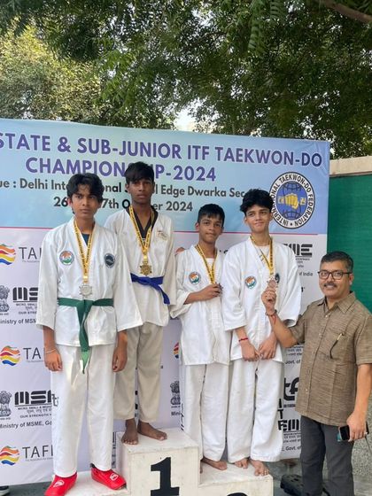 A group of our teenage athletes with their medals from the Delhi State Championship.