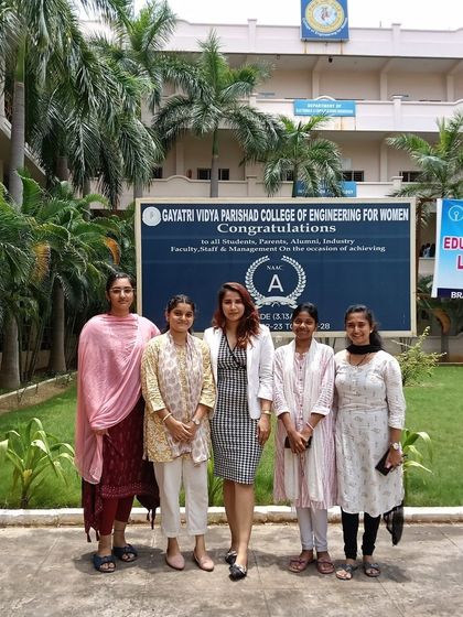 Posing with a few of the student coordinators outside the Gayatri Vidya Parishad College of Engineering for Women after a successful workshop.