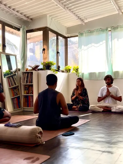 A moment from a 'Yoga Sangraha' workshop, practicing together as a community, or 'sangha'. There is a unique energy that comes from sharing a space with fellow seekers, supporting each other on the path.