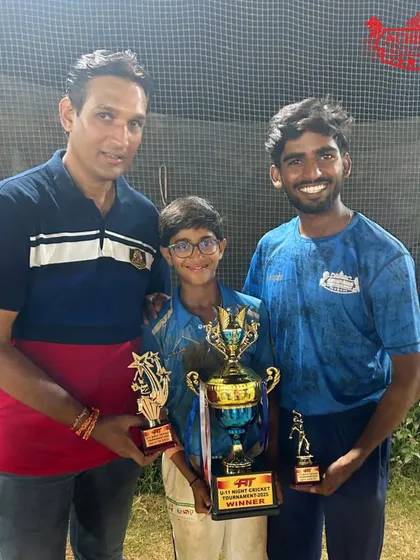 Shaunak Gawade with his haul of trophies, including 'Man of the Series' and 'Best Bowler' at the U-11 Night Tournament.