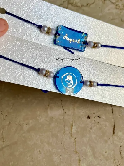 More custom resin Rakhis, including one with a Ganesha design, perfect for the festival.