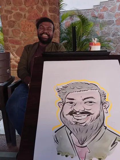 This guest's big, happy smile is perfectly captured in his colorful caricature.
