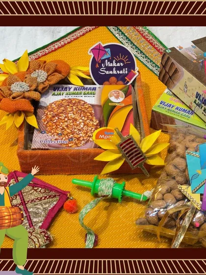 A Makar Sankranti themed hamper with 'chikki', peanuts, and a kite, all brought to life with festive animations.