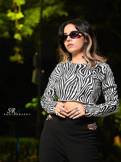 The full-color version of the street style shot, showing the vibrant city lights.