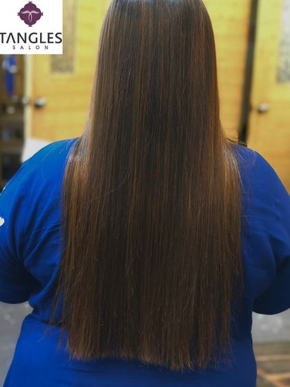 This client received a beautiful gold chocolate balayage, and we finished with a hair botox treatment. The botox sealed the cuticle, making the color appear more vibrant and the hair ultra shiny and manageable.