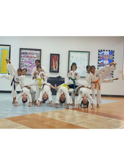 Another angle of our young students' flexibility and coordination drills during the Independence Day event.