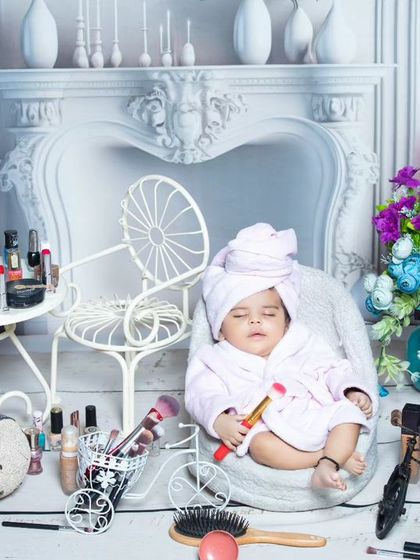 Another view of the baby spa, highlighting the tiny chairs and table full of nail polish.