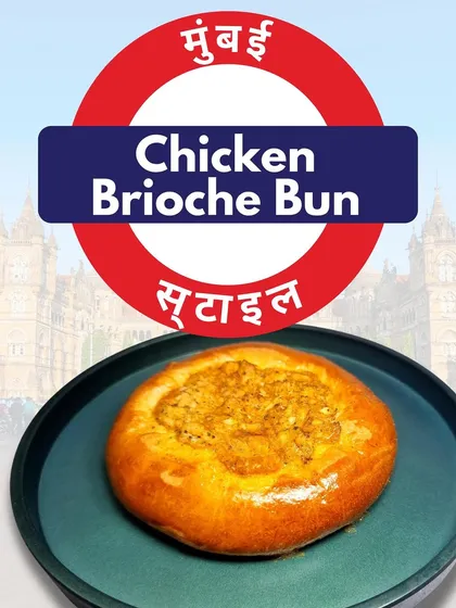 A taste of Mumbai in every bite. This is my Mumbai Style Chicken Brioche Bun, featuring a buttery, soft bun that I bake myself, loaded with flavorful chicken. The graphic playfully uses the Mumbai local train logo to give it a desi feel.