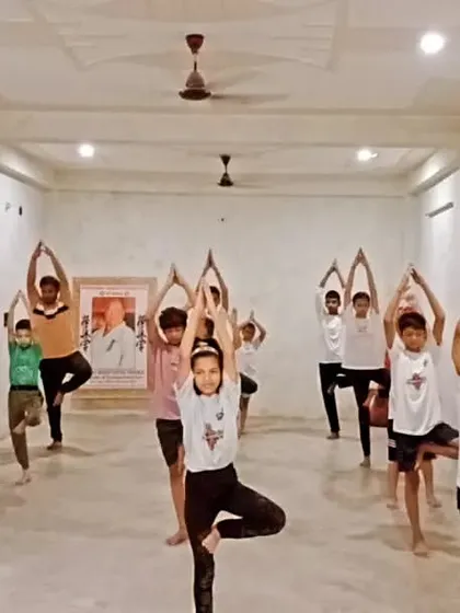 The entire class holding the Vrikshasana pose. It's a great way to build collective focus.