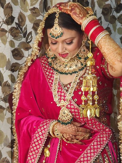 A moment of quiet reflection. This pose highlights the detailed jewelry and the flawless side profile, showing the contouring and highlighting work.