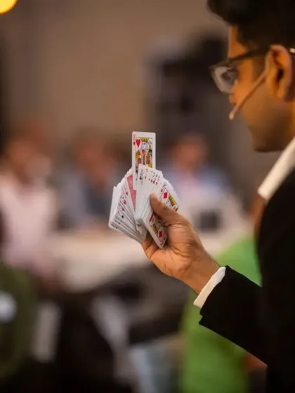 Performing a card illusion during a corporate show for Maverick Capital in Bangalore. My stage act is designed to engage and entertain large audiences, making it perfect for conferences and galas.