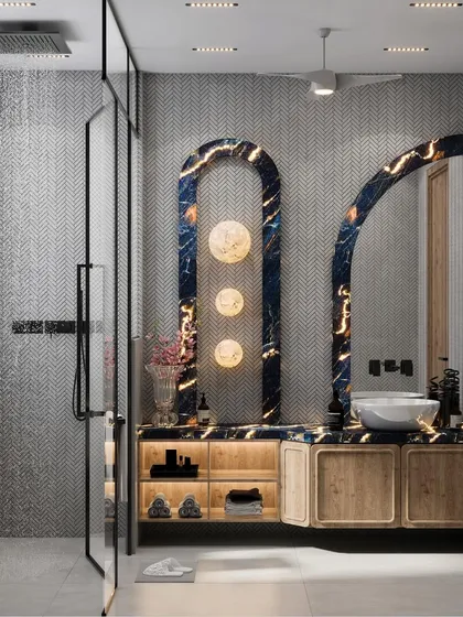We believe every room deserves to be a sanctuary, including the bathroom. This design features a striking backlit blue marble panel, warm wooden cabinetry, and chevron tiles, blending bold aesthetics with practical features for a serene, spa-like experience at home.
