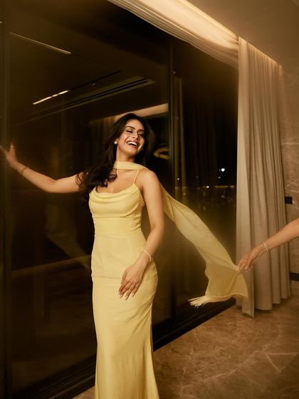 A joyful, smiling shot that captures the fun and celebratory mood of a wedding event.