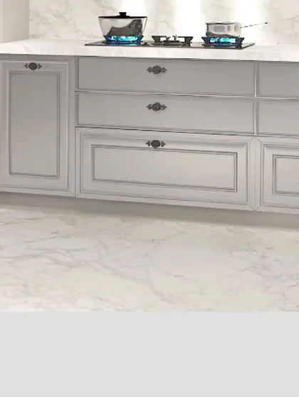 This shot highlights the clean lines and elegant hardware of my classic cabinetry. The simple, raised-panel drawers are paired with vintage-style handles, sitting atop a beautiful marble-patterned floor.