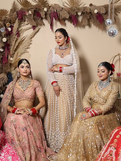 A group shot of five different bridal looks created by my students on portfolio day. This shows the diversity of talent and creativity fostered in my academy.