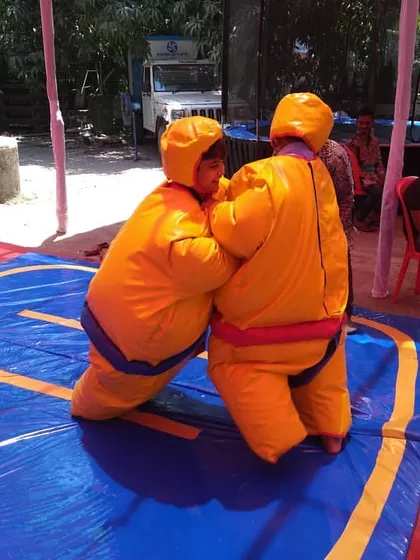 The sumo suit wrestling game is guaranteed to get laughs. I provide the padded suits and mat for a safe and hilarious competition that's just as fun for spectators as it is for the participants.