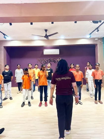 A shot of our instructor teaching a dance routine to a group of enthusiastic children from the NGO at our Gurgaon studio.