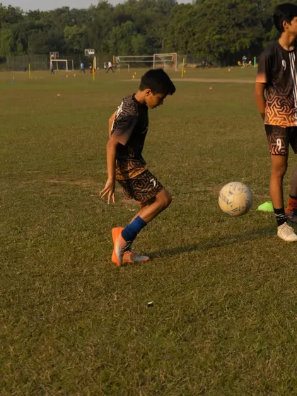 Another look at Chahit Samota working on his ball control. Consistent practice on fundamental skills is the foundation of success.