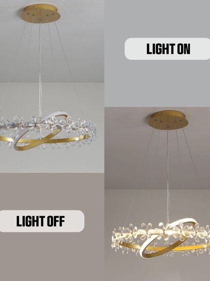 A modern crystal ring chandelier, shown both off and on. You can see how the crystals catch the light to create a sparkling, glamorous effect.