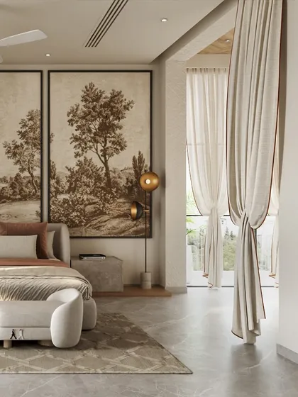 The interplay of light and shadow from the large window adds depth to this neutral bedroom. The soft, tied-back curtains create an elegant frame, enhancing the room's airy and sophisticated character.