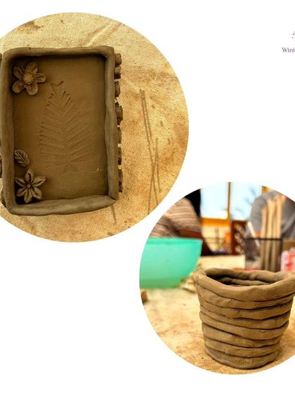 A close-up of the beautiful, textured clay pieces created during our hand-building pottery workshop. Participants learned to make unique items like trays and coil pots.
