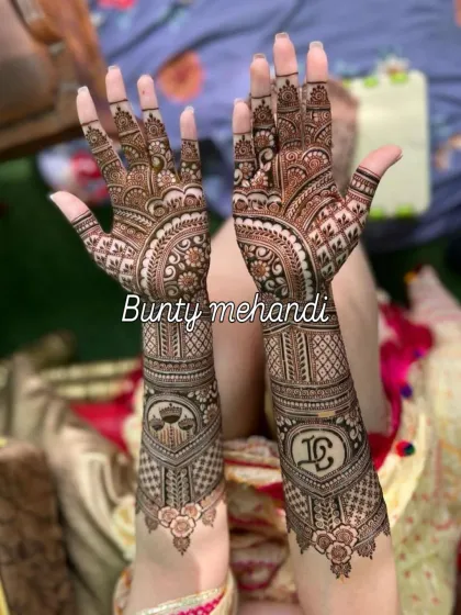 I can weave your personal story into the mehendi, like these custom initials for the couple. It's a special touch that makes the design uniquely yours.