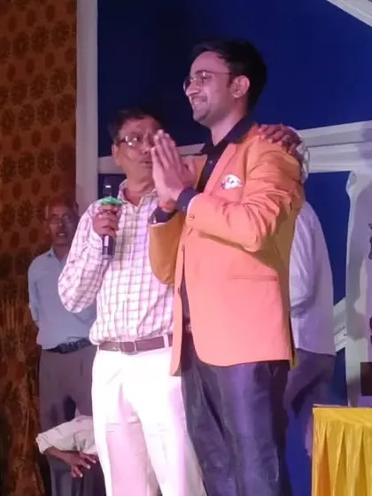 Being honored on stage at a cultural event in Shalimar Garden after my performance.