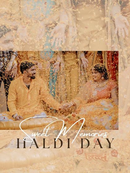 A sweet haldi memory of a couple holding hands, surrounded by a shower of marigold petals.