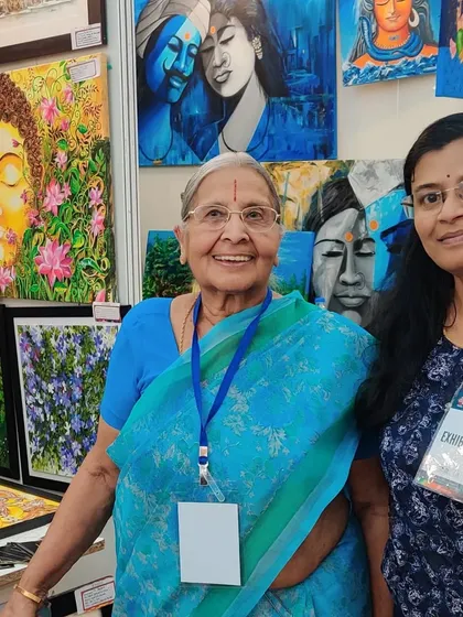 A cherished moment with a senior visitor who appreciated my art.