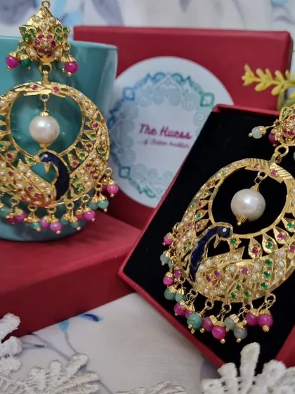 The 'मोर चंदबाली' (Peacock Chandbali) in a different colour variation. This one features a stunning blue peacock, adding a unique touch to the classic design.