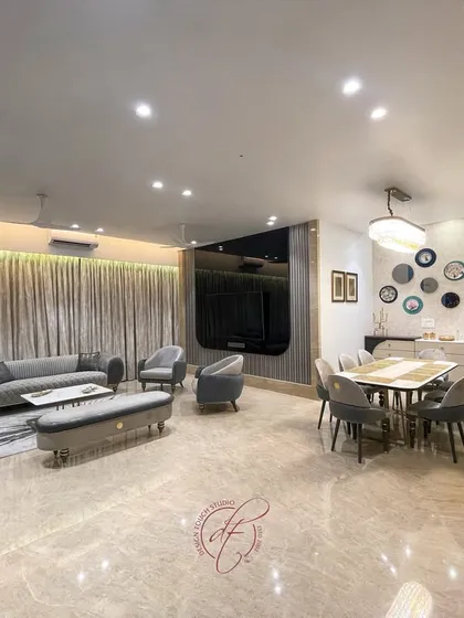 An overall view of the living and dining area, emphasizing the spaciousness and the elegant flow between the zones. The design is a testament to our ability to create beautiful, functional spaces for everyday life.