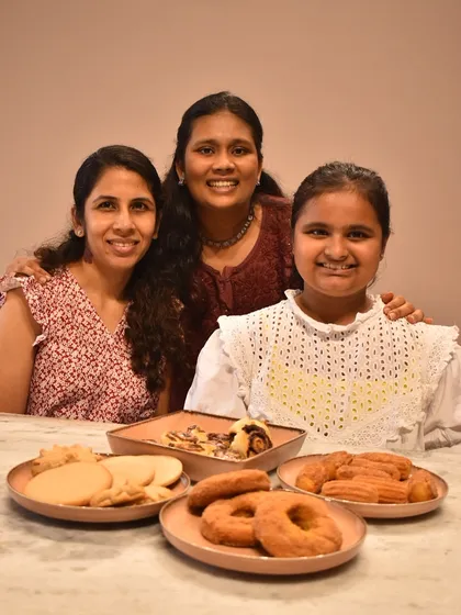 This little chef and her mom are all smiles after a private class where she learned to make cinnamon churros, donuts, rolls, and cookies.