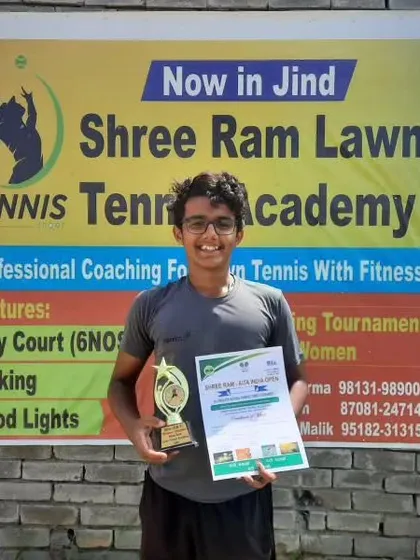 Kartikey Tyagi and his partner after winning the Doubles title of the U18 Championship series in Jind.