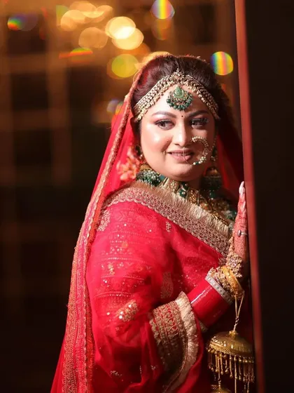 A candid shot of the bride, capturing her natural beauty and the elegance of her chosen jewellery.