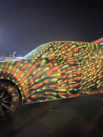 Another shot of the fully painted MINI, a unique art car created for a commercial event. This shows my ability to apply my skills to any surface, no matter the shape or size.