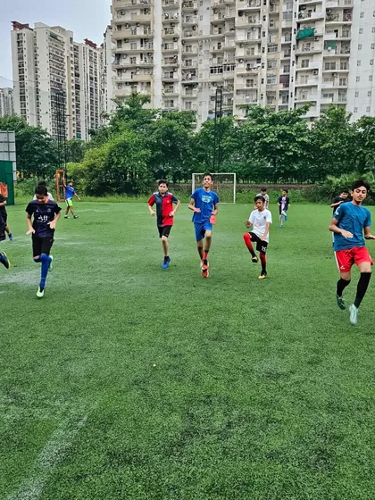 Game face on. Our players go through warm-up sprints and dynamic stretches to prepare their bodies for the session ahead.