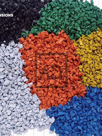 These are the colored rubber granules used to create poured EPDM safety flooring for playgrounds. The variety of colors allows for endless creative and fun designs.