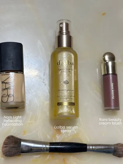 The foundation of a great look. A quality foundation, a serum spray for glow, and a cream blush are key to creating that dewy, skin-like base.