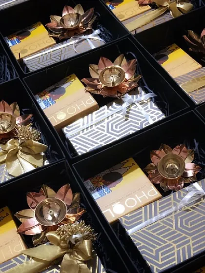 A look at a bulk order of my minimal yet festive gift hampers. Each box contains a lotus diya and other thoughtful items, perfect for corporate Diwali gifting.