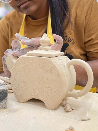 This beautifully detailed teapot was created entirely by hand using slab-building techniques. It shows the amazing things you can make once you learn the basics.